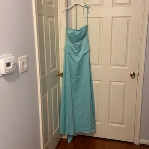 Aqua strapless bridesmaids dress. Size 8 never worn new with tags.
